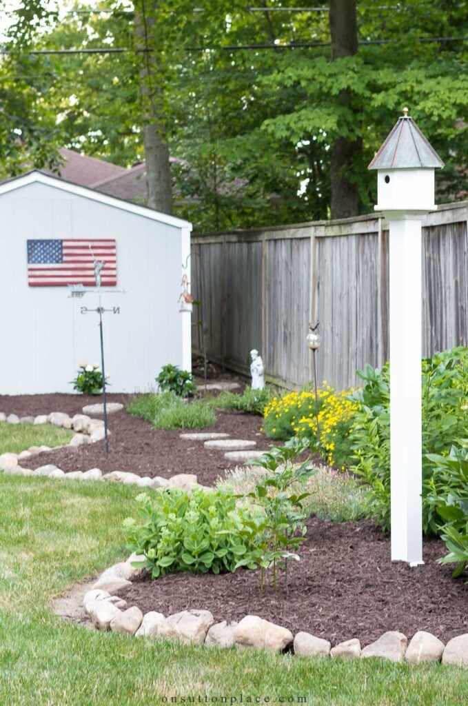 edging-stones-along-fence-row-garden-679x1024.jpg